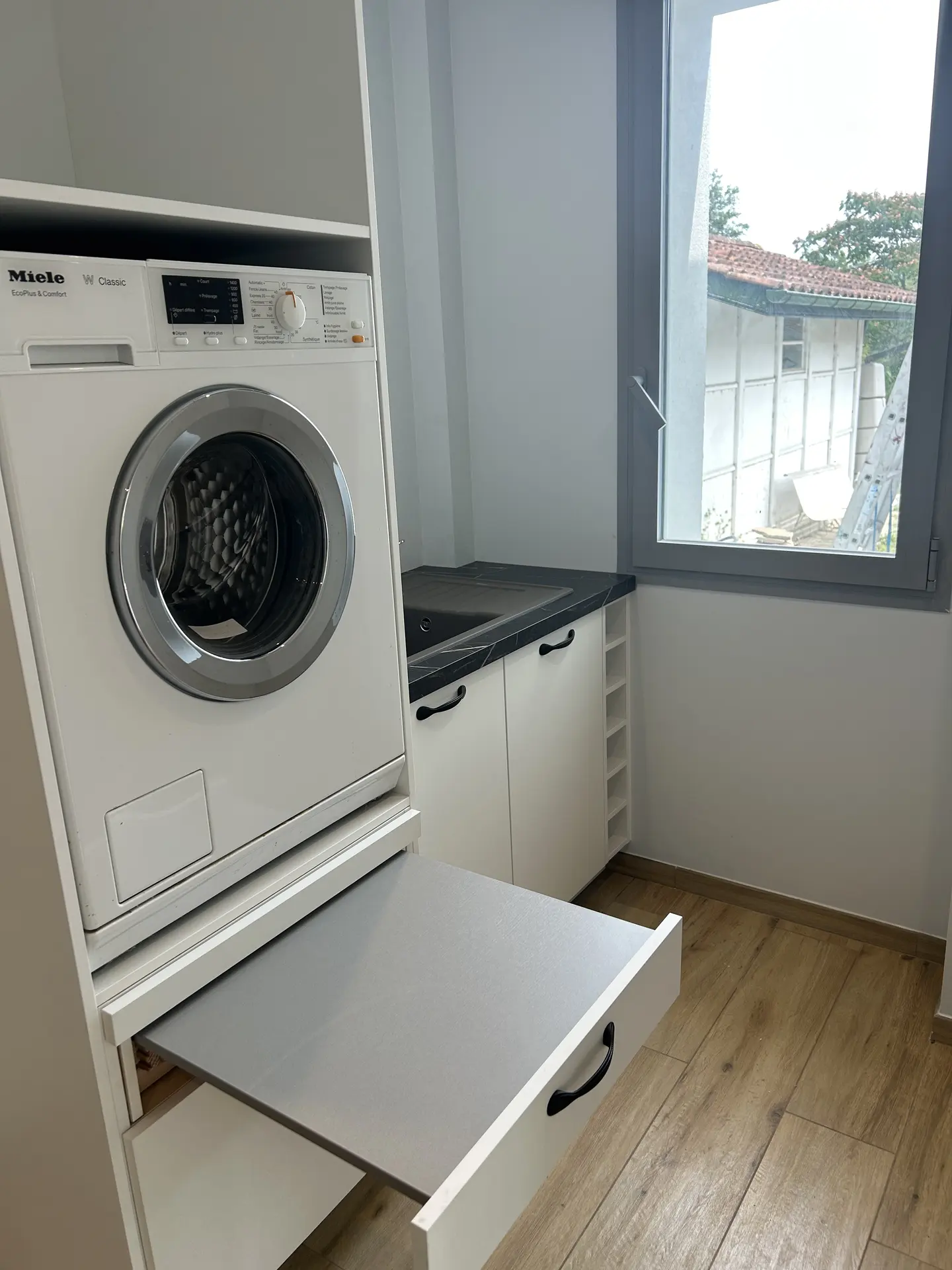 Buanderie aménagée sur mesure par 3J Aménagements à Salies-de-Béarn